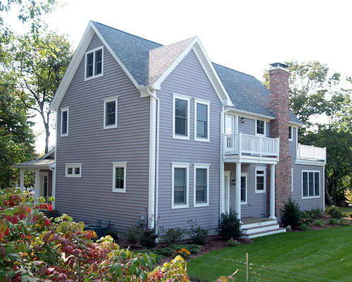 Tear Down Gray Two Story Roof Deck